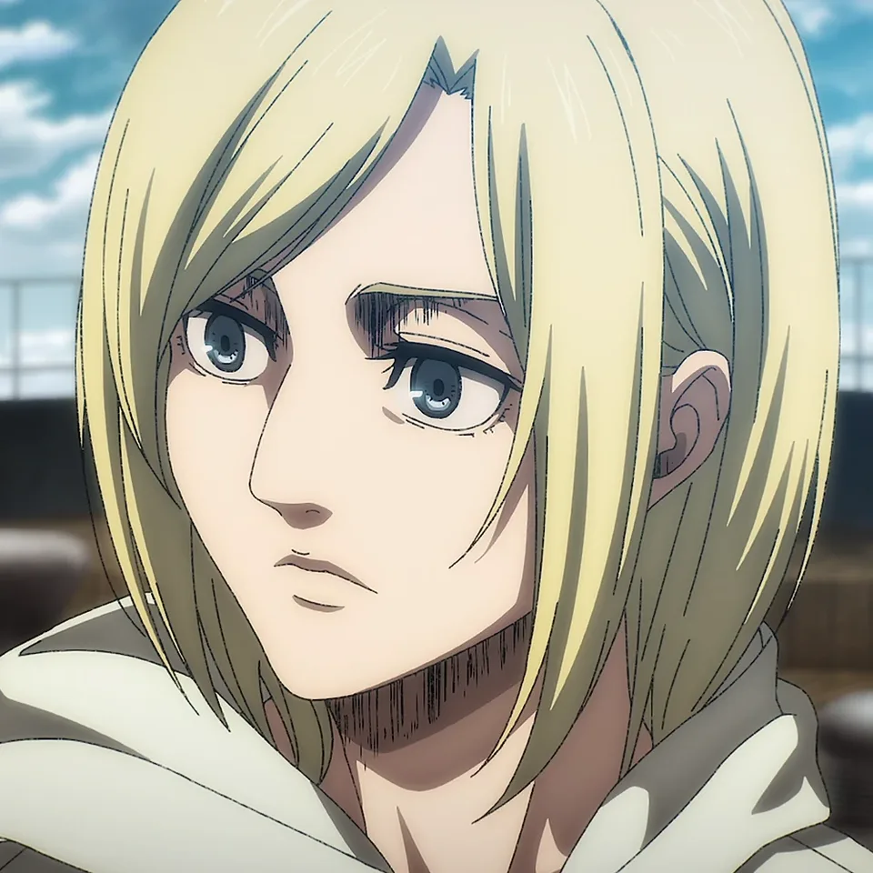 Portrait of a pale blonde young woman with a blunt nose and cold blue eyes, hair in a loose bun, wearing a white hoodie under her uniform