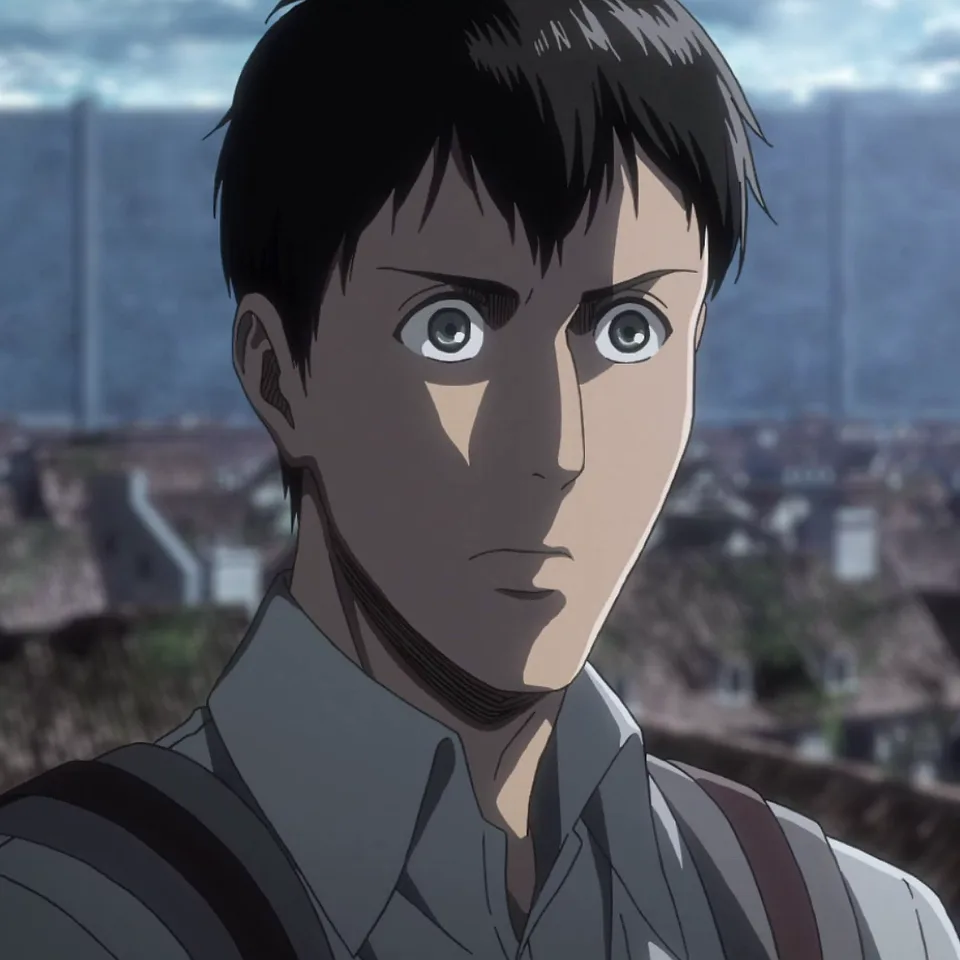 Portrait of a very tall, dark-haired young man with a nervous, downcast expression in a cadet corps uniform
